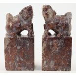 A pair of Chinese mythical beast soapstone seals, luduan, 20th century, each of rectangular form,...