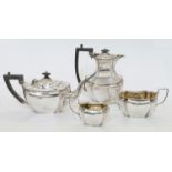 A three-piece silver tea set, comprising: a teapot, a cream jug and a twin handled sugar bowl, Sh...