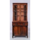 A William IV mahogany secretaire bookcase, first quarter 19th century, the moulded cornice above ...
