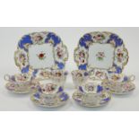 A Coalport part tea service, c.1835, decorated with panels of blue and cream ground and painted w...