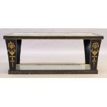A modern ebonised and parcel gilt coffee table, 21st century, inset with painted oxidised mirror ...