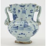 A Savona maiolica twin-handled vase, c.1700, blue Savonese shield mark to underside, the bulbous ...