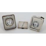 Two pocket watches, comprising: one with white enamel dial and Roman numerals, the interior stamp...