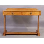 A Victorian satinwood hall table, second quarter 19th century, two drawers on trestle base to bun...