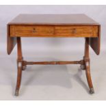 A George III mahogany sofa table, first quarter 19th century, the frieze with two drawers on eith...