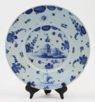 A Savona maiolica footed plate, c.1700, blue Savonese shield mark to the underside, with large bo...