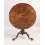 A George III mahogany tilt top table, last quarter 18th century, on tripod base and castors, 71cm...