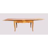 A French fruit wood draw leaf farmhouse dining table, first quarter 20th century, on curved legs,...