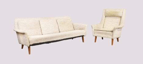 A Danish three seater sofa and matching armchair, c.1950, with woollen upholstery on square taper...