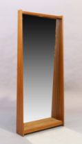 A large Italian solid teak wall mirror, c.1960, of rectangular form with shelf to base, 130cm hig...