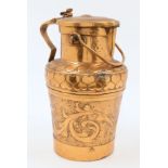 A large Arts and Crafts copper pail, c.1900, repoussé decorated with flowers and foliage and hear...