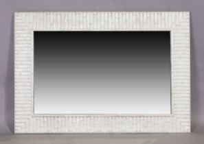 A white painted bamboo form overmantle mirror, c.1960, with rectangular frame and mirror plate, 1...