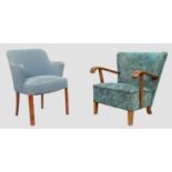 Manner of Frits Henningsen, a Danish armchair, c.1930/40, with blue fabric upholstery on walnut s...