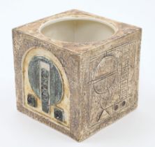 A Troika pottery cube form flower pot, 20th century, with geometric designs in shades of teal, cr...