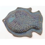 Birte Steincke & June Sarene, a blue-glazed terracotta wall plaque modelled as a fish, 20th centu...