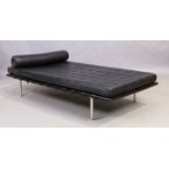 After Ludwig Mies Van Der Rohe, a leather 'Barcelona' style daybed, c.2000, with black leather cu...