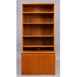 A teak bookcase cabinet, c.1960/70, with four shelves above two cupboard doors, 193cm high, 90cm ...