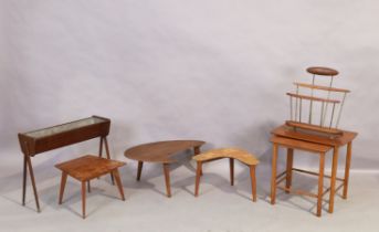 A group of mid-century furniture, comprising: a Utility teak boomerang table, a further teak kidn...