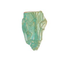 An Egyptian blue-green glazed faience fragment of a chalice, 3rd Intermediate Period, 1075-716 B....