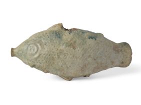A large hollow Parthian turquoise glazed ceramic fish rhyton circa 2nd-3rd Century A.D., set on f...