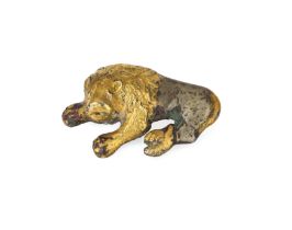 Property from a UK Private Collection To Be Sold With No Reserve A gilt silver recumbent lion f...