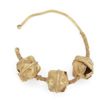 A gold ear ornament with three gold beads, 11th century, Persia, 4.2cm. diam. 5 grams Provenance...