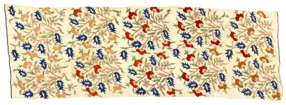 An Ottoman style embroidered linen panel, 19th century or later, the plain field with a panel at ...