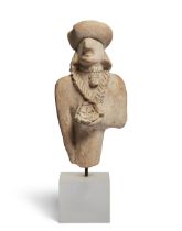 A fragmentary Cypriot terracotta worshipper figure, wearing necklaces and holding a phiale, the h...