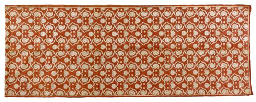 A woven silk panel, possibly India, 20th century, with botehs and flower heads on a delicate latt...
