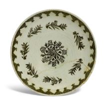 A Kutahya pottery dish, Ottoman Turkey, first half 19th century, of shallow form, on straight foo...