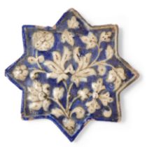 Property from the Estate of Prof. Michael Rogers An Ilkhanid moulded pottery star tile, Sultanab...