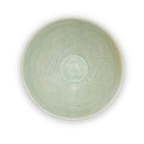 A Chinese qingbai-glazed 'double fish' bowl Song dynasty The delicately potted bowl of conical ...