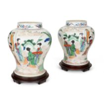 A pair of Chinese wucai 'Goddess brings a Son' jars Qing dynasty, 19th century Each painted and...