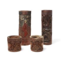 Three Chinese bamboo brush pots and a Japanese brush pot 19th - 20th century Comprising a pair ...