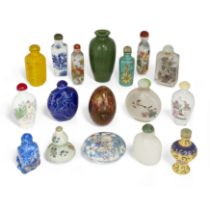 A group of Chinese snuff bottles and a paste box and cover 20th century Comprising two inside-p...