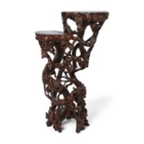 A Chinese hongmu 'sanduo' rootwood stand Qing dynasty, 19th century Naturalistically carved and...