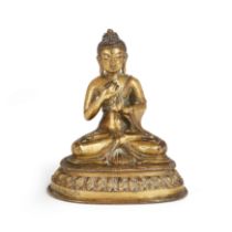 A Nepalese gilt copper-alloy documentary figure of Vairocana Buddha  Early 19th century (dated b...
