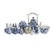 A rare Chinese blue and white ewer, a cup, and twelve Chinese 'doll's house' miniature vases Qin...