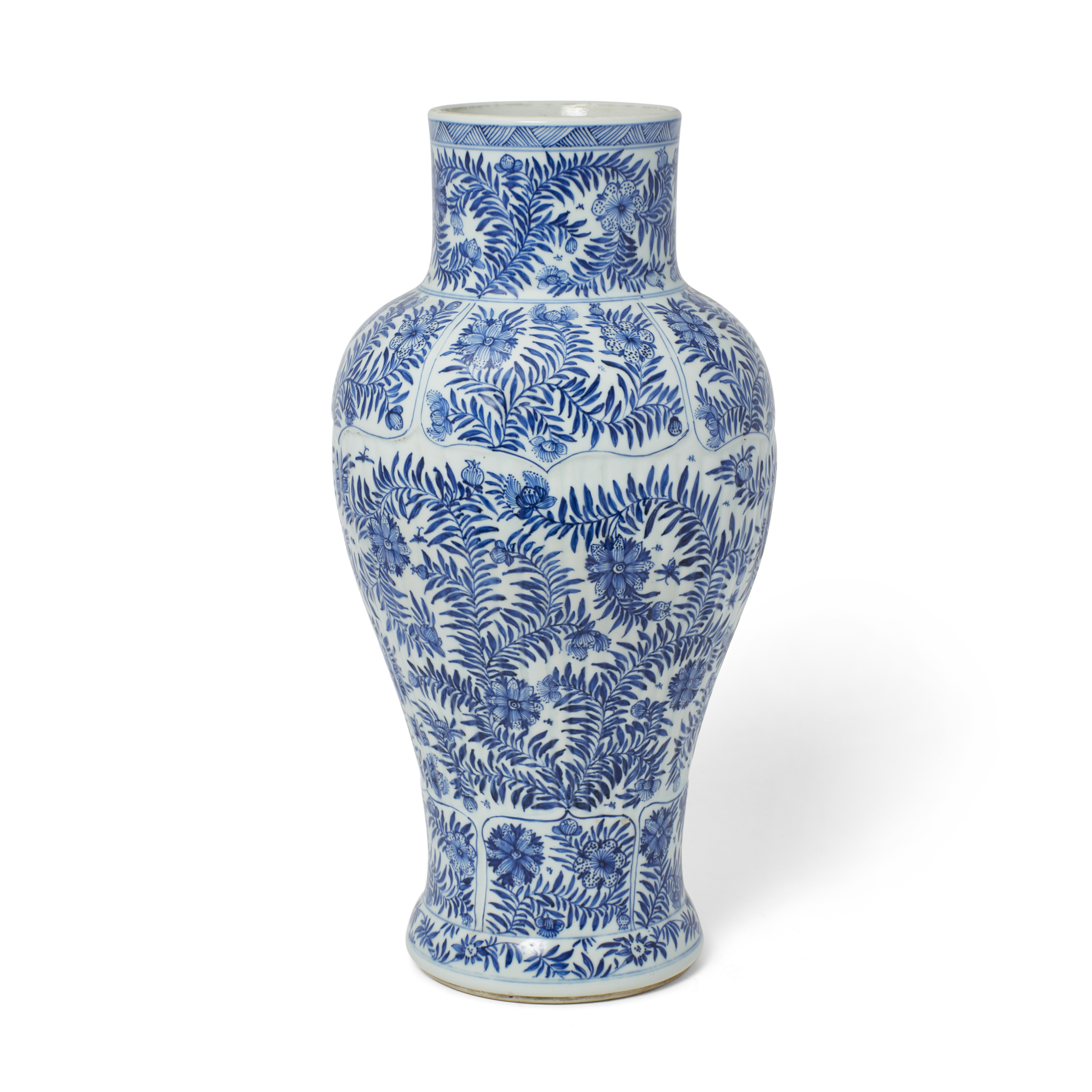A Chinese blue and white moulded 'floral' baluster vase Qing dynasty, Kangxi period The baluste...