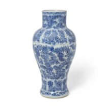 A Chinese blue and white moulded 'floral' baluster vase Qing dynasty, Kangxi period The baluste...