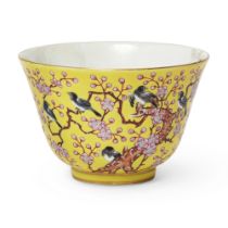 A Chinese famille rose yellow-ground 'prunus and magpies' cup Qing dynasty, Tongzhi mark and per...