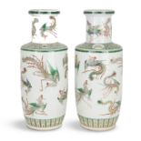 A pair of large Chinese famille verte phoenix vases Qing dynasty, 19th century Each decorated t...