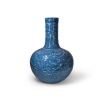 A Chinese lavender-glazed moulded ‘dragon’ vase, tianqiuping  20th century The globular body ri...