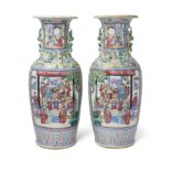 A pair of large Chinese Canton famille rose figurative vases Qing dynasty, 19th century Each of...