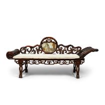 A large Chinese hongmu chaise longue mid-20th century The slatted seat backed with a reticulate...