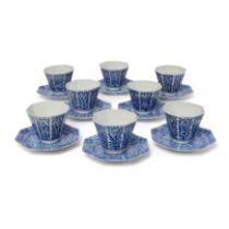 A set of eight Japanese blue and white porcelain tea cups and saucers 19th century Of octagonal...