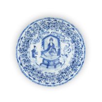 A rare Chinese blue and white 'Buddhist' dish Qing dynasty, Kangxi period Painted to the centre...