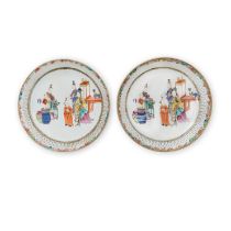 A pair of Chinese famille rose 'ladies and boys' dishes with reticulated rim Qing dynasty, 18th ...