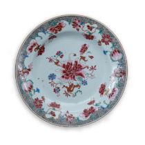 A Chinese famille rose 'peony' plate Qing dynasty, 18th century Decorated to the central reserv...