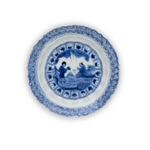 A small Chinese blue and white 'scholar and beauty' moulded barbed-rimmed dish Qing dynasty, Kan...